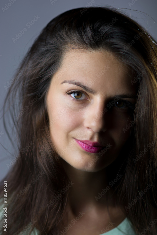 beautiful businesswoman posing over grey beautiful businesswoman posing over grey