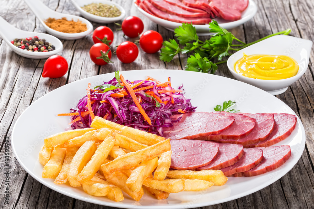 french fries and sliced smoked meat with cabbage salad french fries and sliced smoked meat with cabbage salad