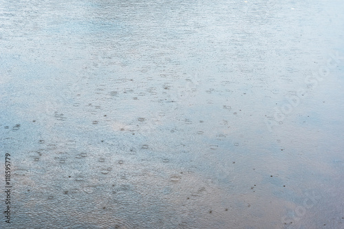 Rain on water surface.