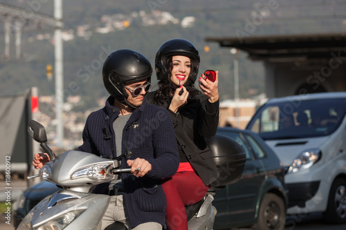 young couple in scooter