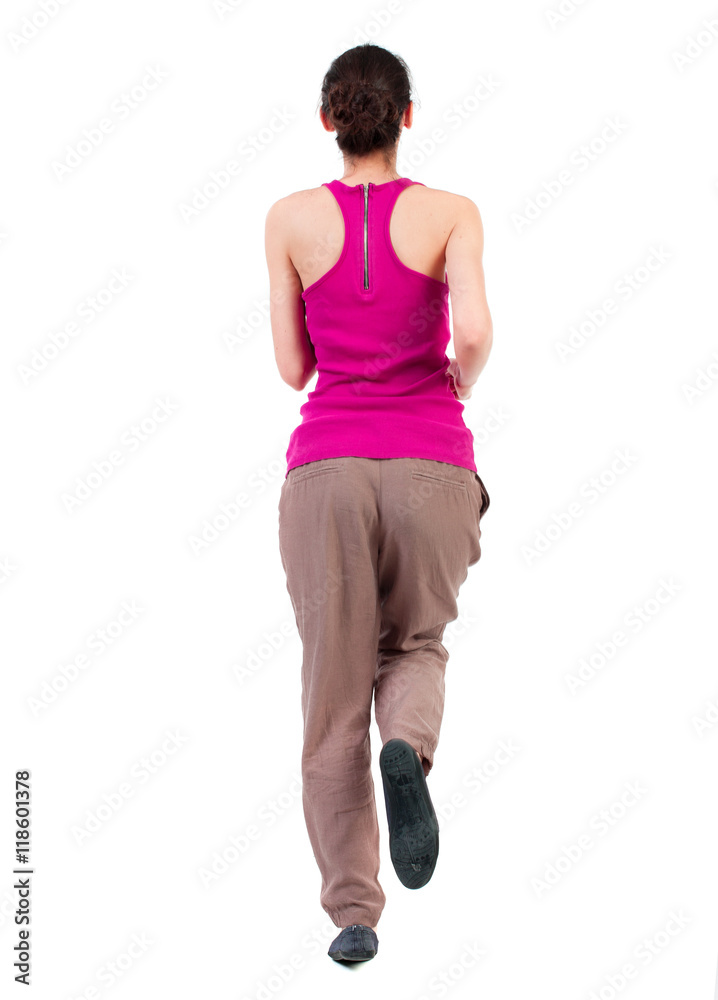 back view of walking curly woman. backside view of person. Rear view people collection. Isolated over white background. dark-skinned girl on morning jog. back view of walking curly woman. backside view of person. Rear view people collection. Isolated over white background. dark-skinned girl on morning jog.