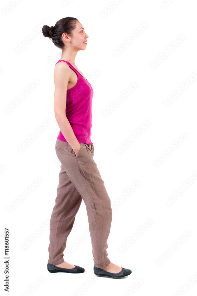 back view of walking  curly woman.  backside view of person.  Rear view people collection. Isolated over white background. dark-skinned girl is smiling and looking up.