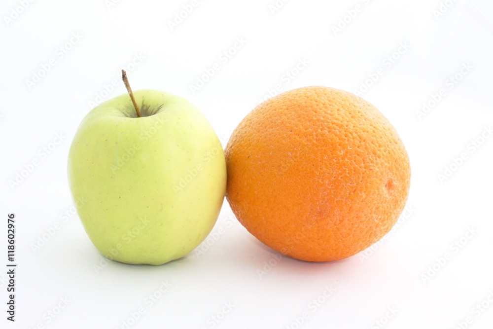 Yellow Apple and orange on a white background