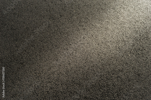 Foto Hintergrund nasser Asphalt im seitlichen Gegenlicht  -  Background wet asphalt i