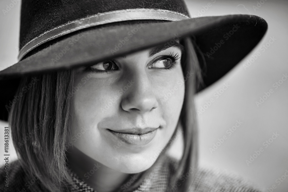 Black and white portrait of beautiful woman in the hat Black and white portrait of beautiful woman in the hat