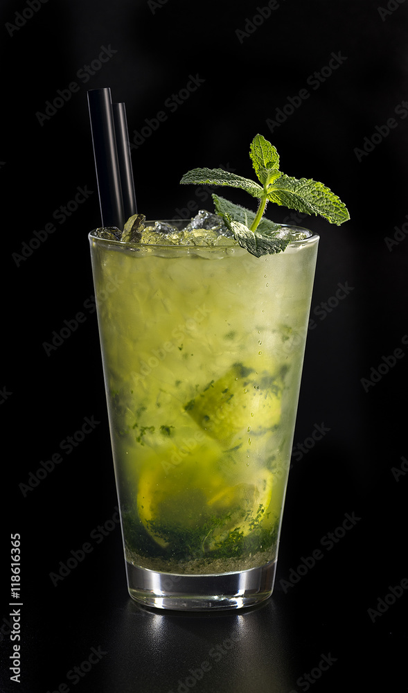 Mint lemonade with lime and lemon in glass Mint lemonade with lime and lemon in glass