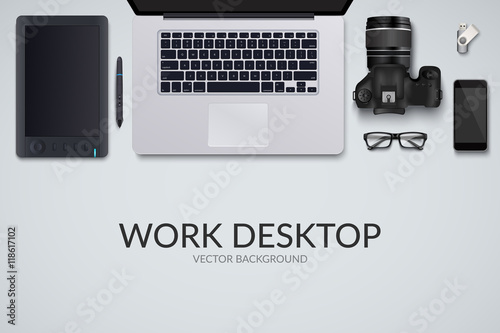 Office desk table with laptop, photo camera, glasses, graphic tablet, pen, phone and flash drive. Top view with copy space. Eps10 vector template.