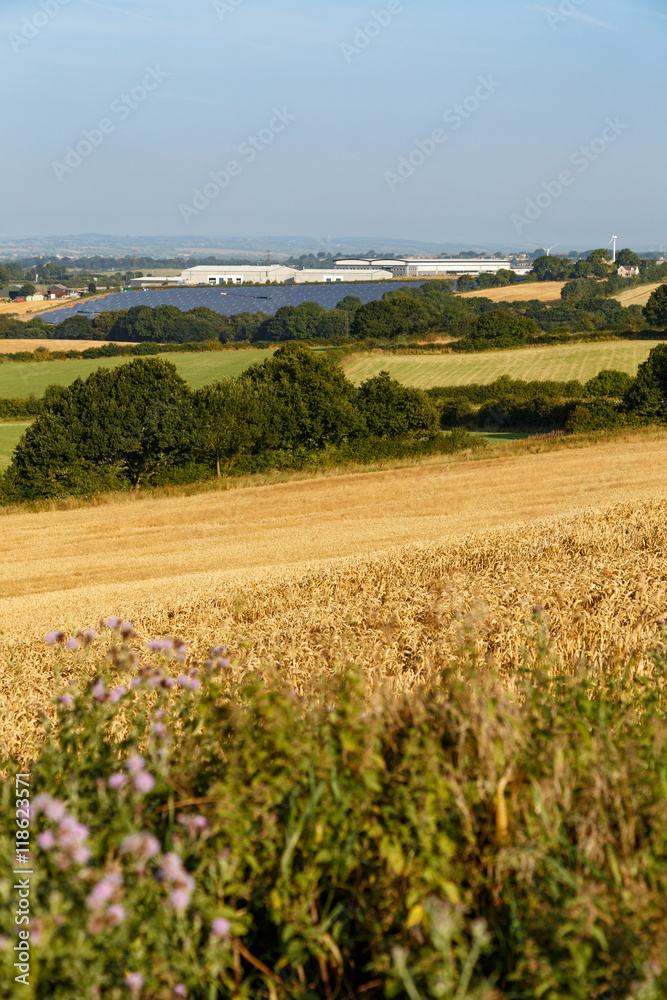 KIRKBY-IN-ASHFIELD, ENGLAND - AUGUST 15: A solar panel farm located within a rural area. In Kirkby-In-Ashfield, Nottinghamshire, England. On 15th August 2016.