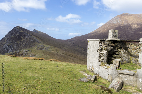 A derelict building on a hillside and near a cliff on Achill Island, Co. Mayo, Ireland.