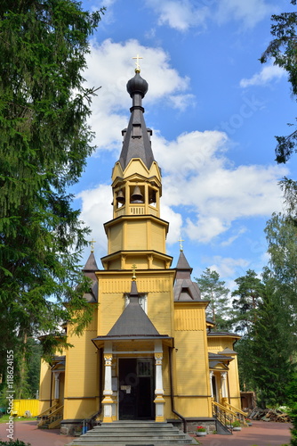 View of the entrance Bell tower of the Church of the Holy apostl photo