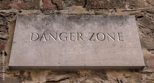 Danger zone. Engraved text.