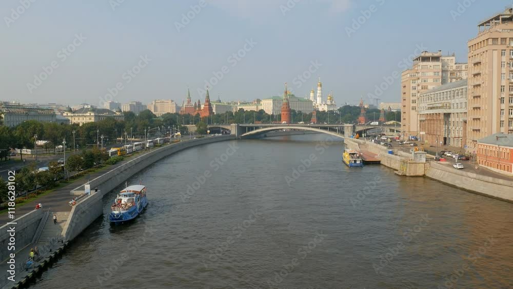 setting sun is lighting modern buildings near Moscow river and downtown with Kremlin in summer time setting sun is lighting modern buildings near Moscow river and downtown with Kremlin in summer time