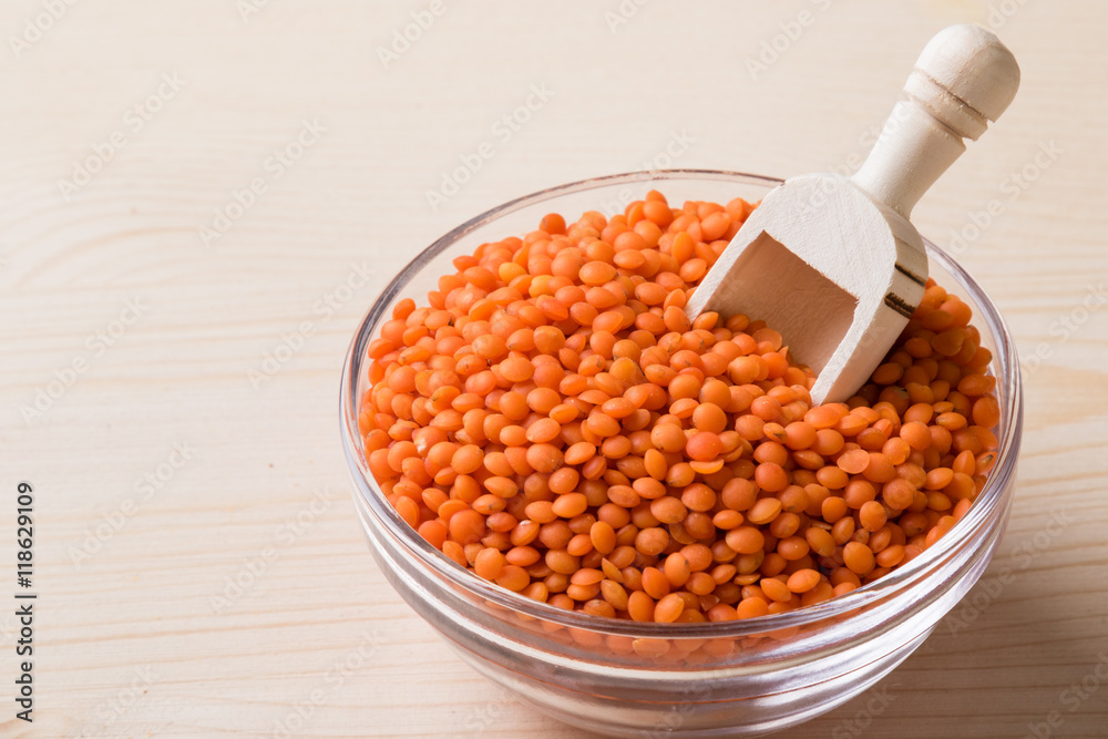red lentils in glass bowl red lentils in glass bowl