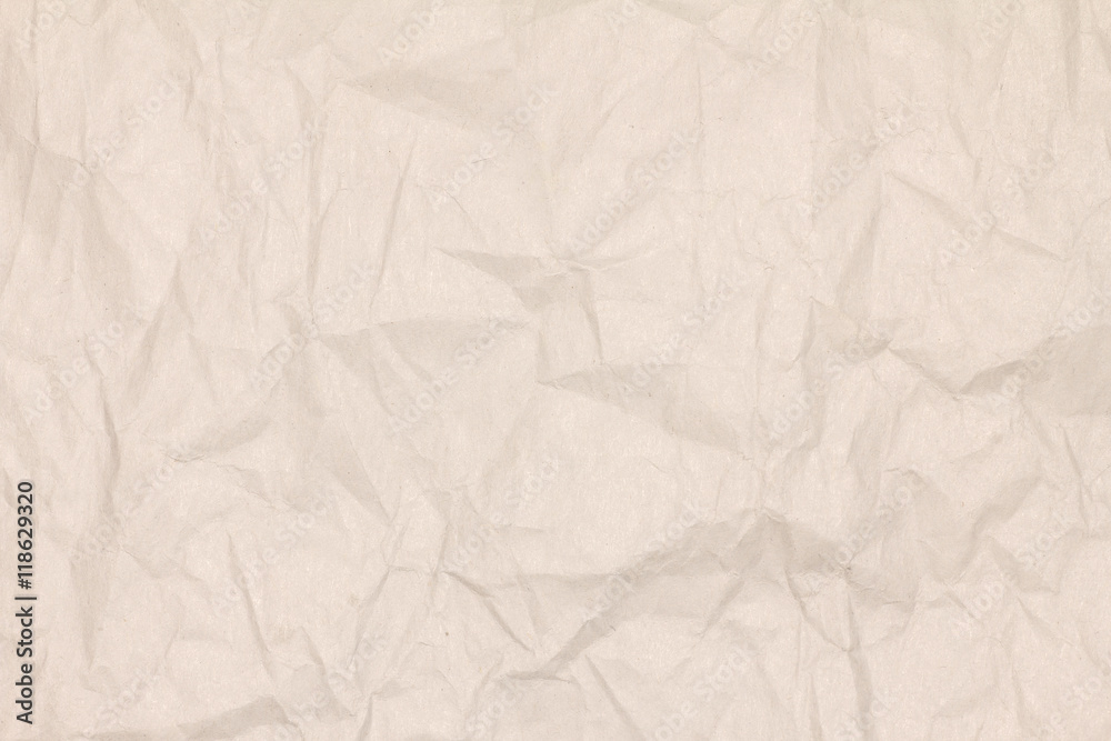 Obraz premium Recycled crumpled light brown paper texture or paper background for design with copy space for text or image.
