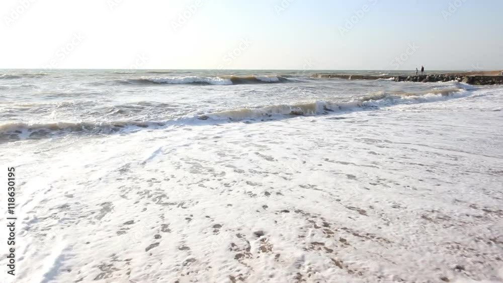 beautiful coast with sand on the beach and strong waves beautiful coast with sand on the beach and strong waves