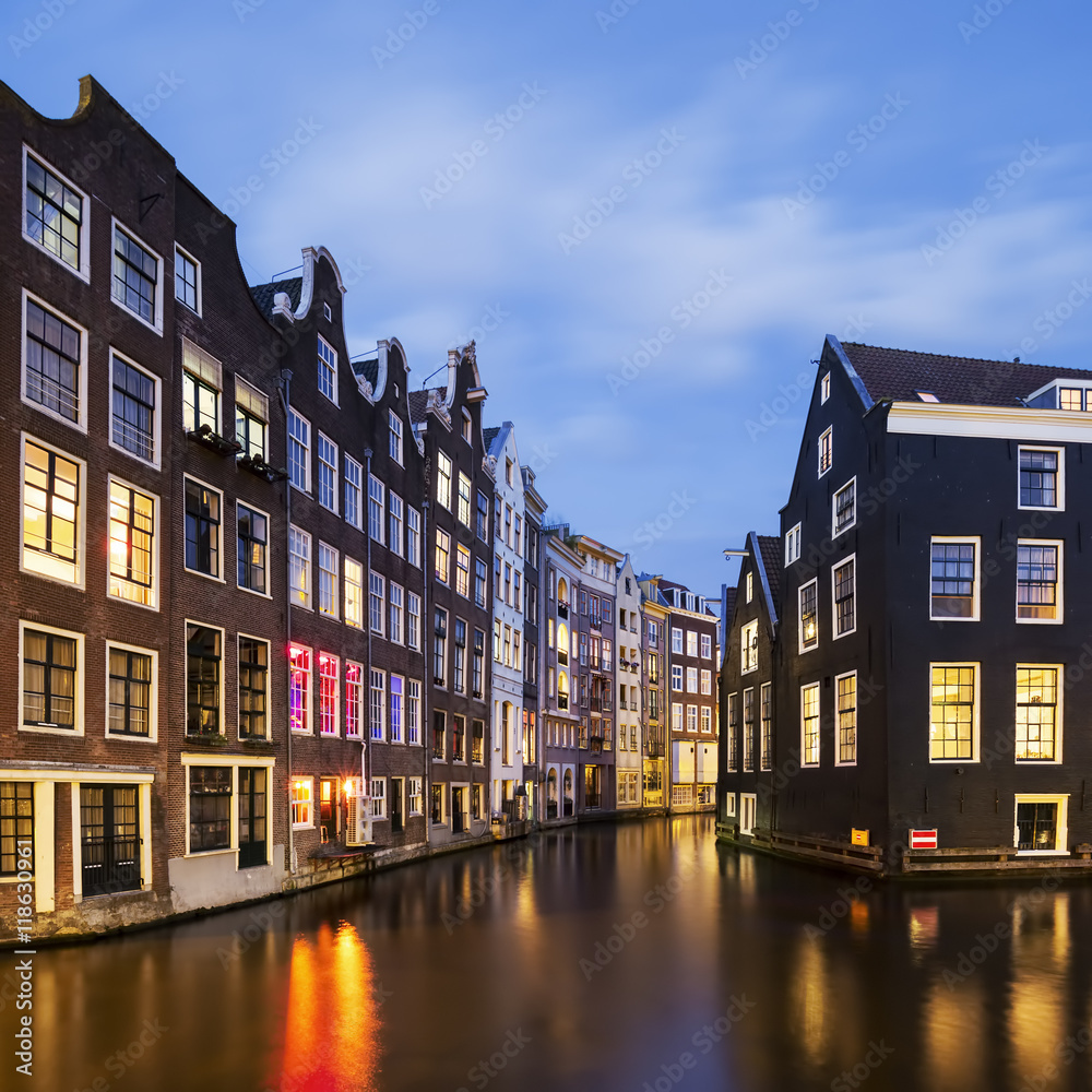 View of famous amsterdam canal by night