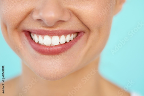 Closeup Of Beautiful Smile With White Teeth. Woman Mouth Smiling. High Resolution Image