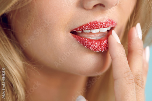 Lip Skin Care. Beautiful Woman Lips With Sugar Lip Scrub On