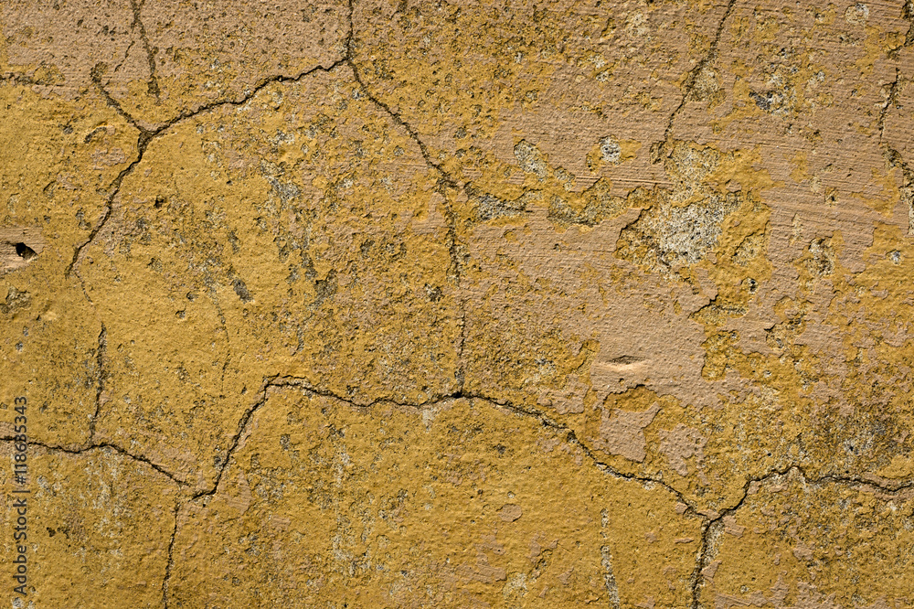 Obraz premium Plastered walls with peeling paint yellow