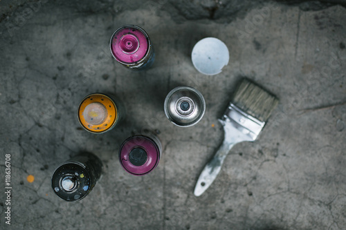 Street art equipment, spray cans and brush 