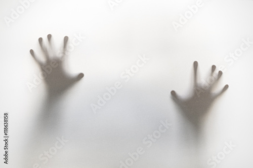 Silhouetted hands