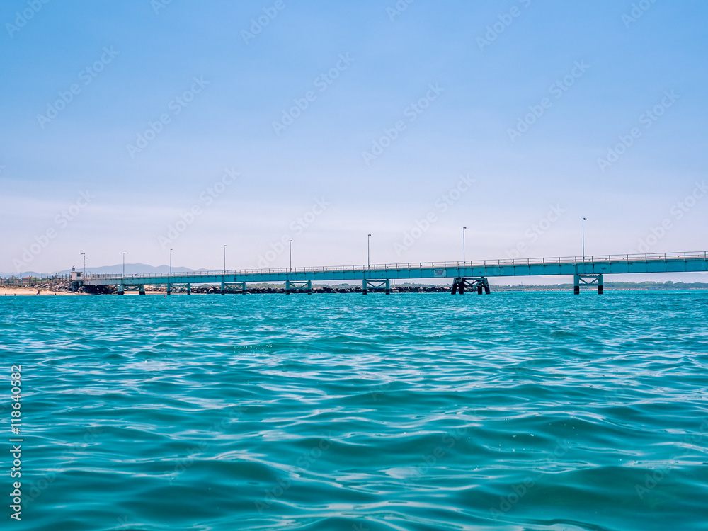Bridge on the sea in Italy