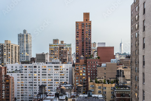 New York City rooftop skyline at dusk.