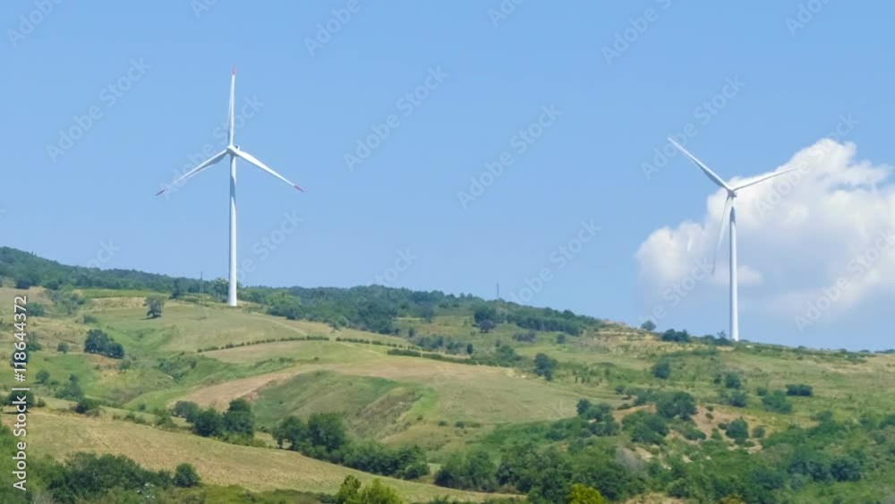 Windmills on the Tuscan hills. Time lapse, zoom in. Italy Windmills on the Tuscan hills. Time lapse, zoom in. Italy