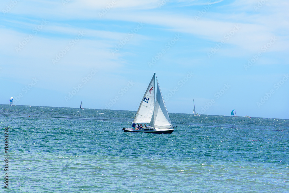 Sailing Boat in Blue Ocean