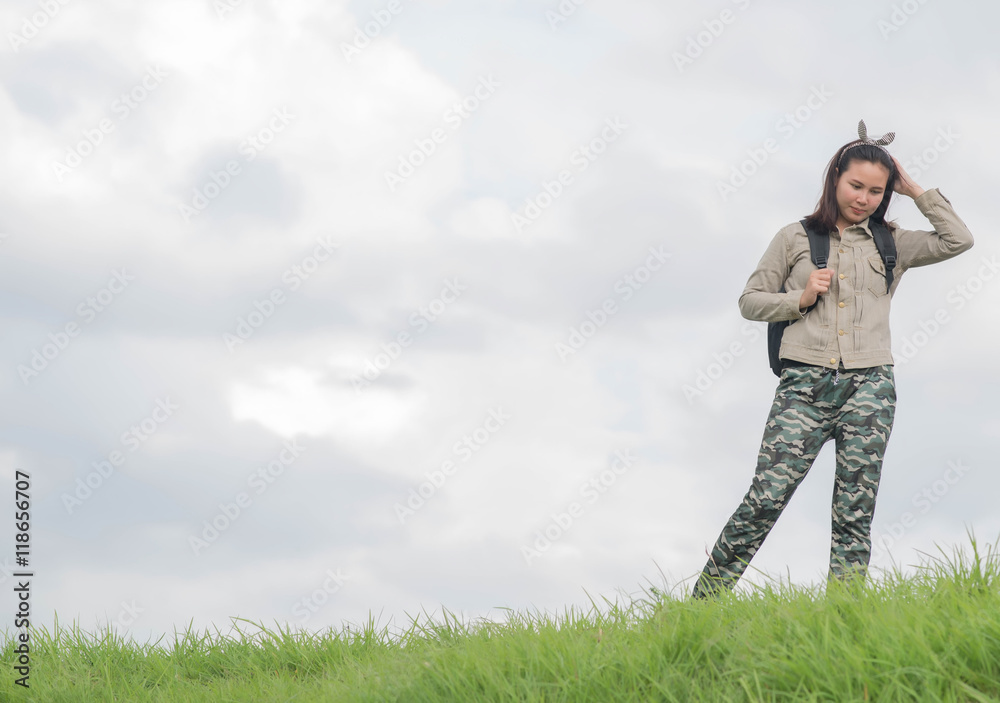 Carefree woman having a good time at the meadow Carefree woman having a good time at the meadow