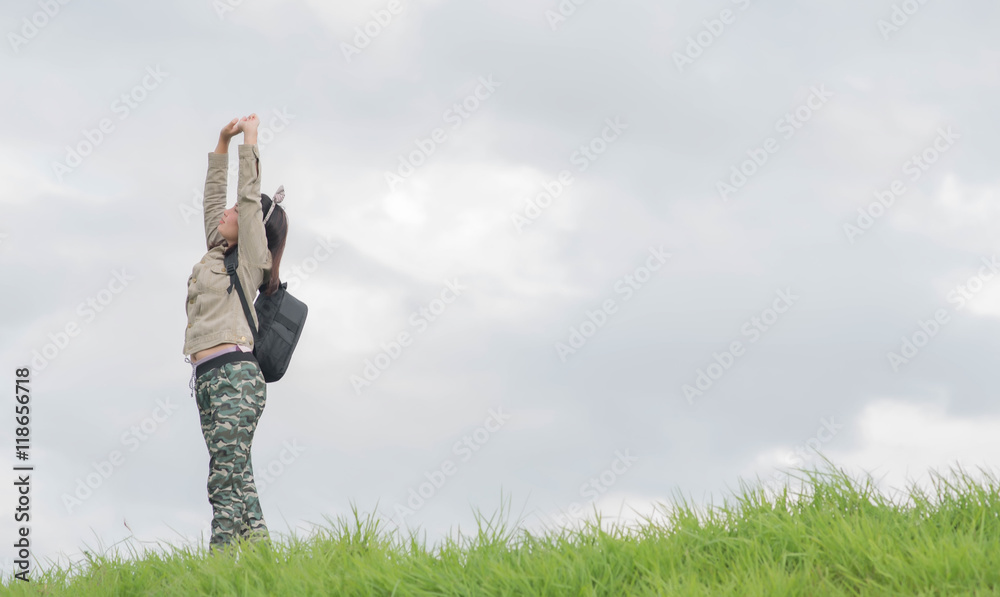 Carefree woman having a good time at the meadow Carefree woman having a good time at the meadow