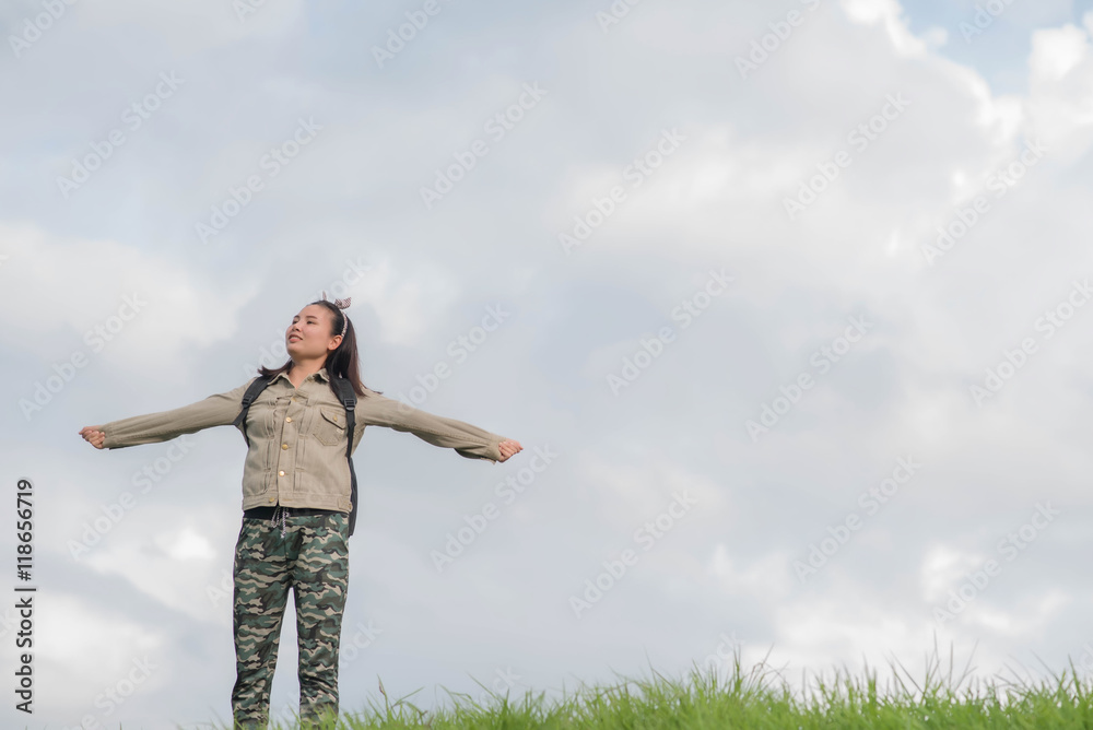 Carefree woman having a good time at the meadow Carefree woman having a good time at the meadow