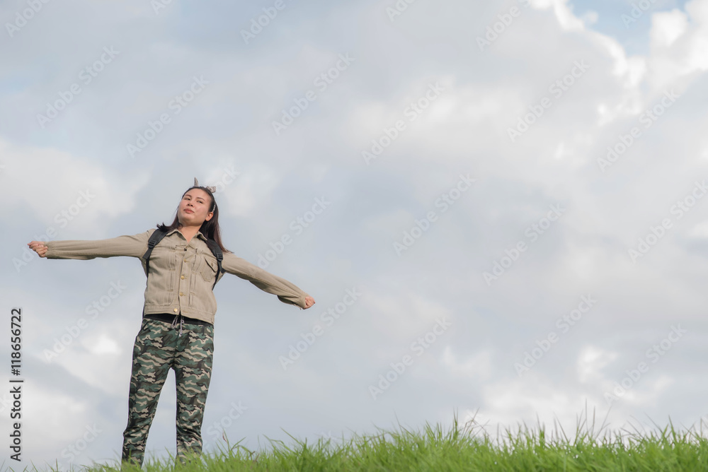 Carefree woman having a good time at the meadow Carefree woman having a good time at the meadow