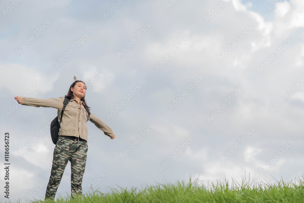 Carefree woman having a good time at the meadow Carefree woman having a good time at the meadow