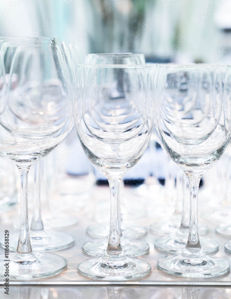 Many empty glasses in a line Many empty glasses in a line