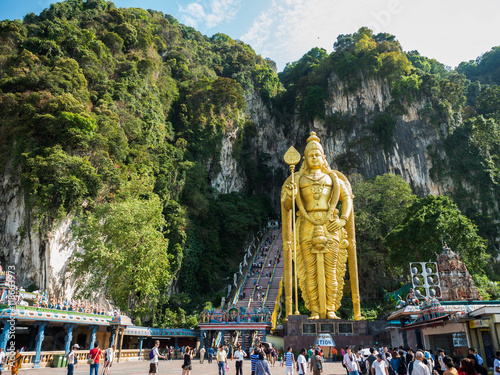 KUALA LUMPUR, MALAYSIA - MAR 1: Tourist and Lord Murugan Statue photo