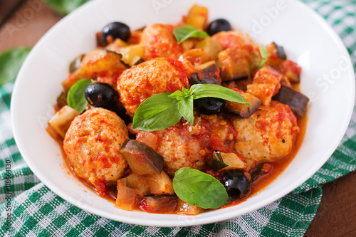 Juicy meatballs of turkey meat with vegetables (zucchini, eggplant, olive, tomato)