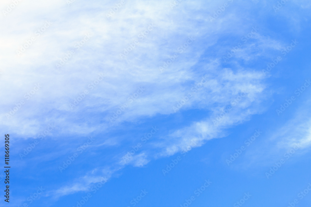 Blue sky background with white clouds. The vast blue sky and clouds sky on sunny day. White fluffy clouds in the blue sky.
