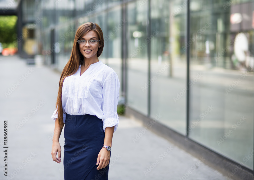 Portrait of a young smiling business woman. Portrait of a young smiling business woman.