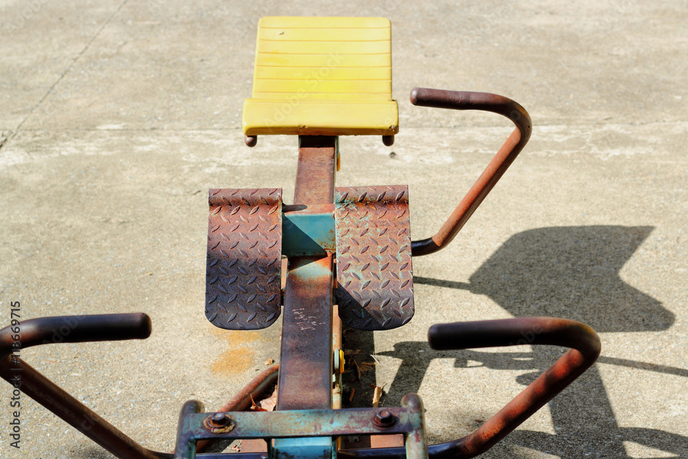 old exercise equipment in public park foto de Stock Adobe Stock
