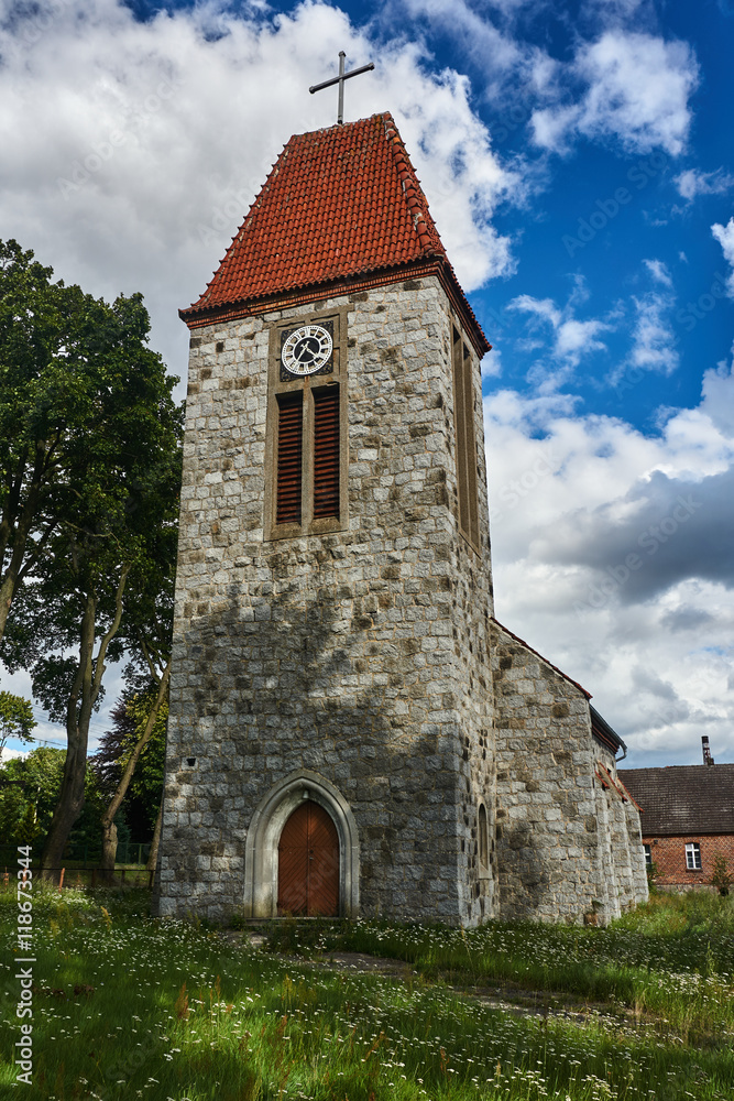 Fototapeta premium Stone tower of the Catholic Church in Poland.