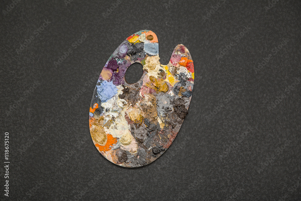 Artist's palette with multiple colors isolated on black Artist's palette with multiple colors isolated on black