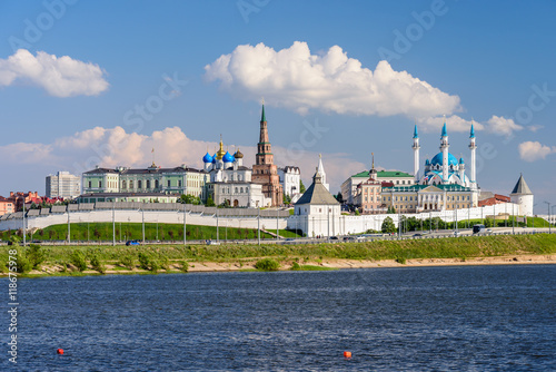 View of the Kazan Kremlin with Presidential Palace, Annunciation Cathedral, Soyembika Tower and Qolsharif Mosque from Kazanka River, Kazan, Russia. photo