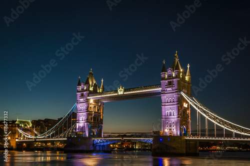 Tower bridge just before dawn, sunrise crossing the river Thames on a clear night in London, England, UK, Europe