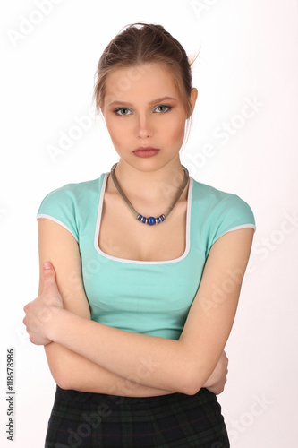 Girl with makeup and necklace. Close up. White background