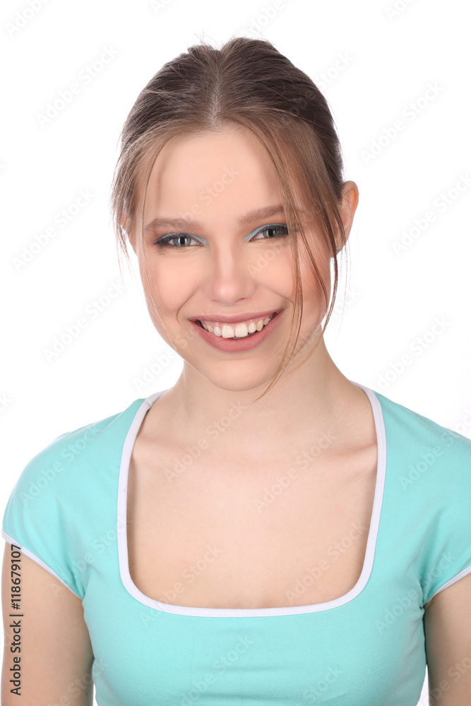 Smiling girl looking into the camera. Close up. White background Smiling girl looking into the camera. Close up. White background