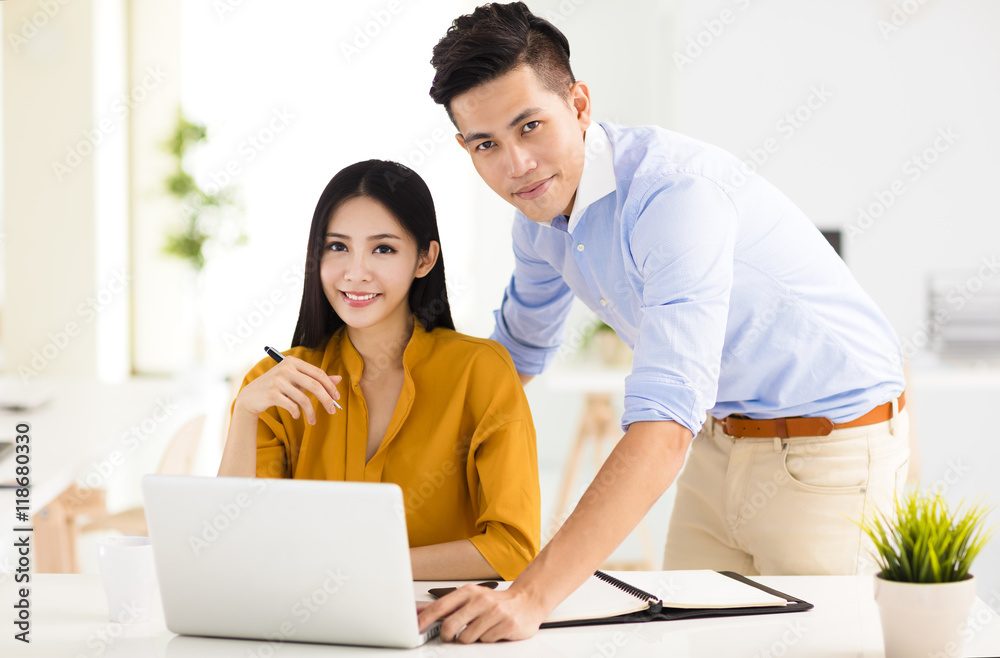 young business man and woman working in office young business man and woman working in office