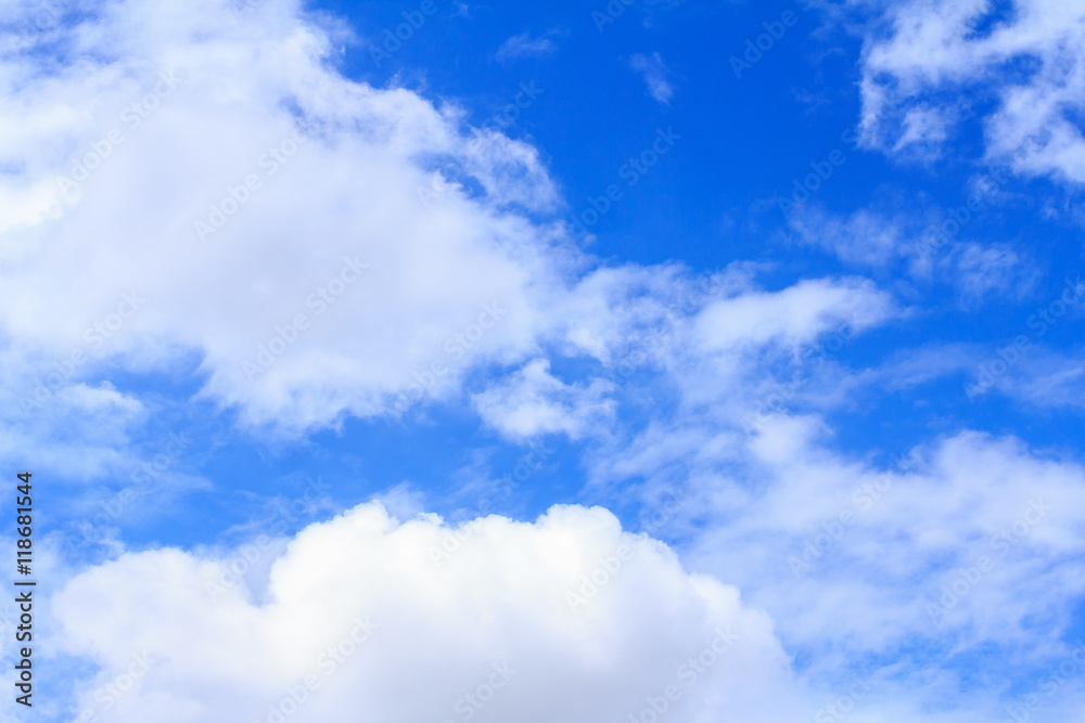 Fototapeta premium Blue sky background with white clouds. The vast blue sky and clouds sky on sunny day. White fluffy clouds in the blue sky.