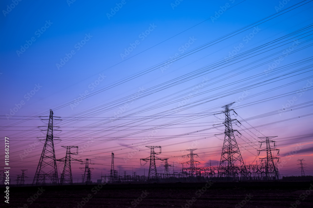 The silhouette of the evening electricity transmission pylon The silhouette of the evening electricity transmission pylon