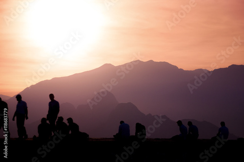 People enjoying sunset.